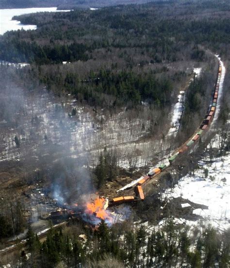 Cleanup begins after freight train derailment, fire in Maine
